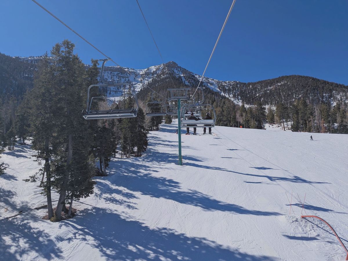 Ski lift and snow-covered slope at Mt. Charleston